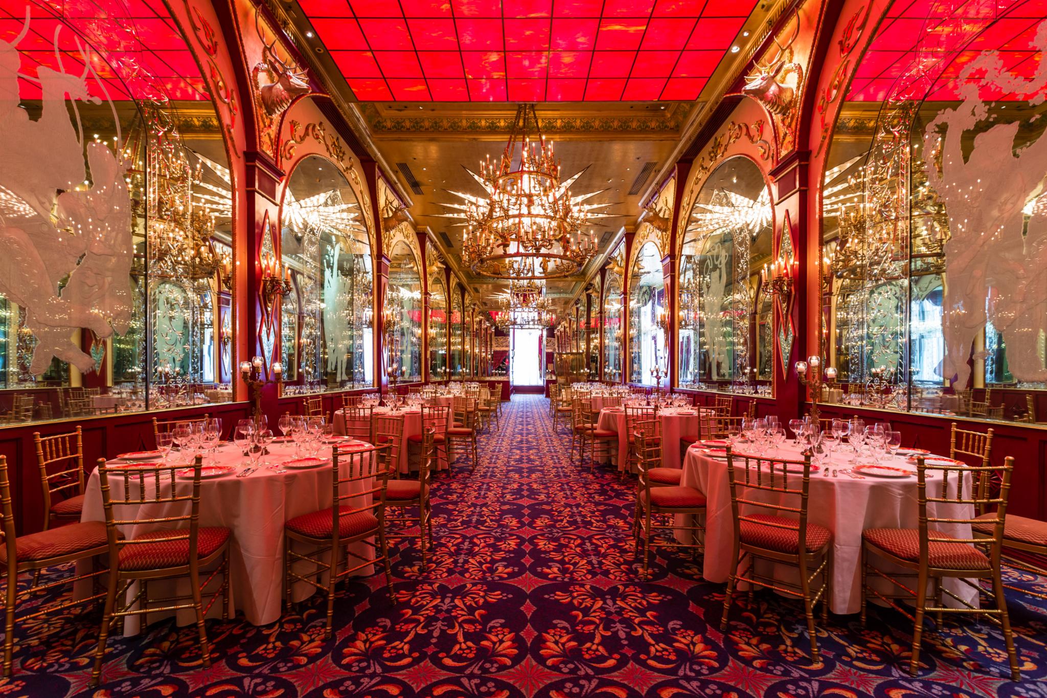 Bear Ballroom 1 Elegant ballroom with red ceiling, mirrored walls, and ornate chandeliers